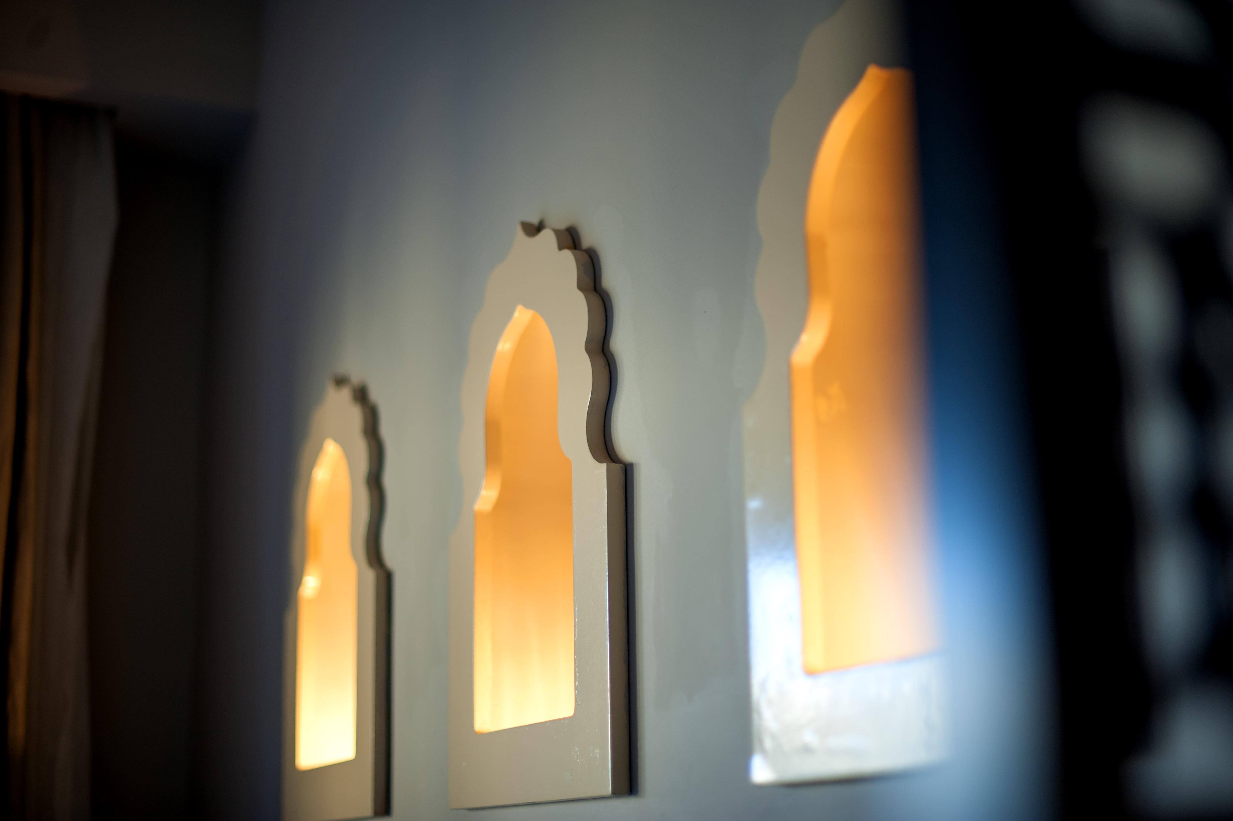 Sunrise Arabian Beach Resort Sharm el Sheikh Esterno foto A set of three windows in the wall of a house