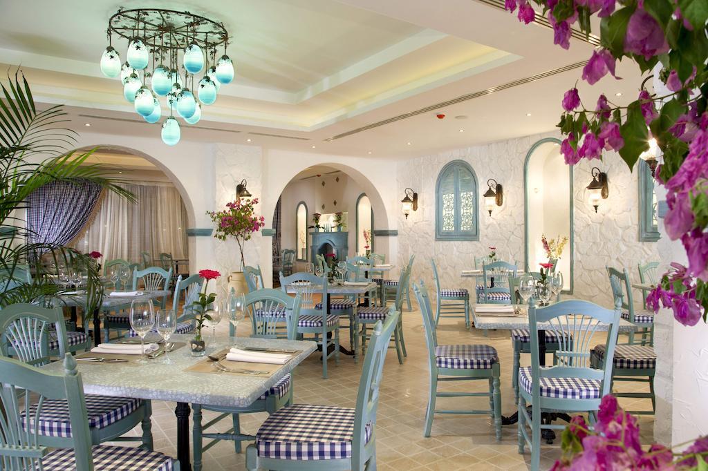 Sunrise Arabian Beach Resort Sharm el Sheikh Esterno foto Restaurant at the Grand Hotel