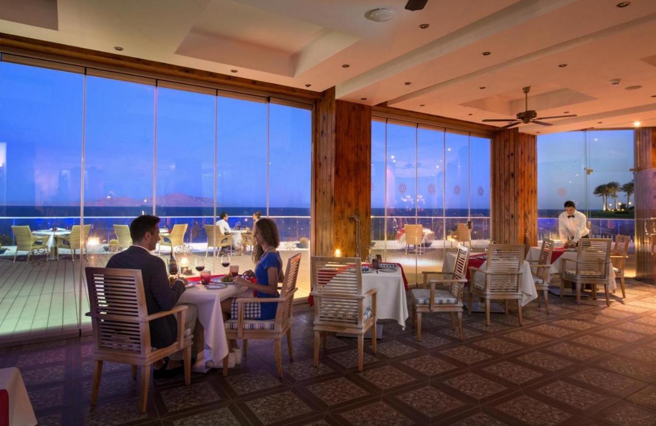 Sunrise Arabian Beach Resort Sharm el Sheikh Esterno foto The restaurant at the resort